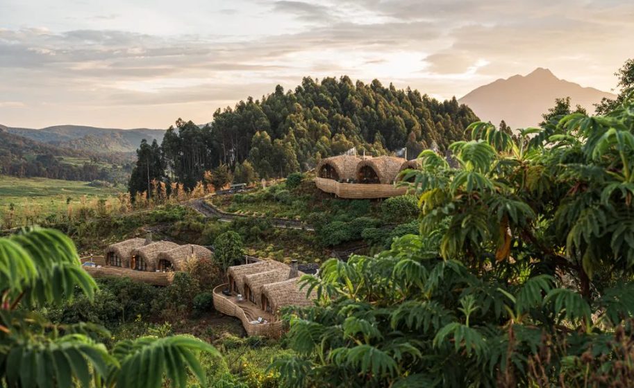 Thatched villas above the Volcanoes, Bisate Lodge Rwanda