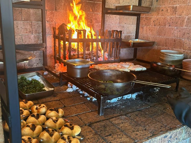 Open-fire cooking in the lodge kitchen