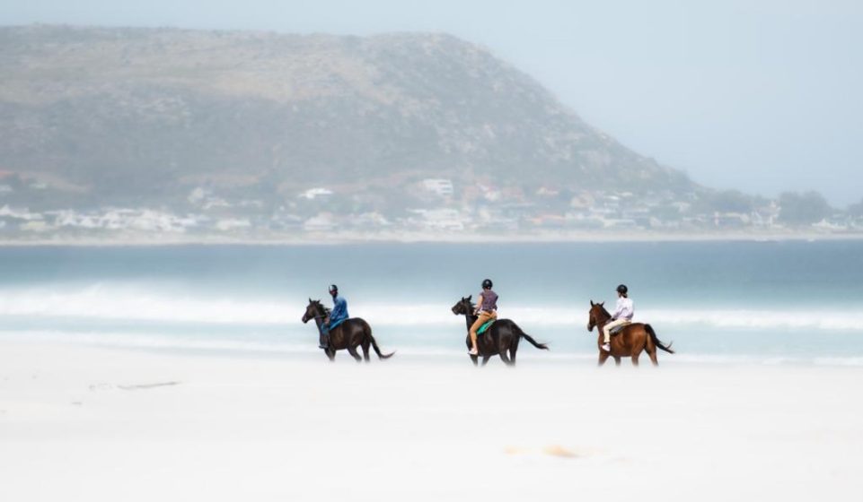 Riding on a Cape beach